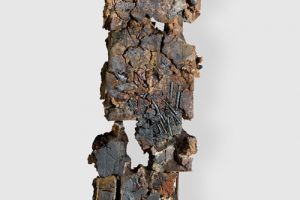 Cwmystwyth Mine Memory. Size: 178cm high x 40cm wide x 20 cm deep. Clay, mine spoil rocks, metals and materials from the mine area