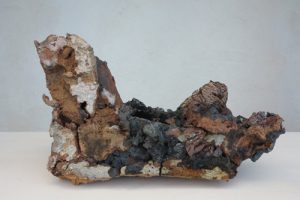 MINE MEMORY 16. mine spoil rocks, ceramic and metals. 55cm long x 26cm high x 20cm deep