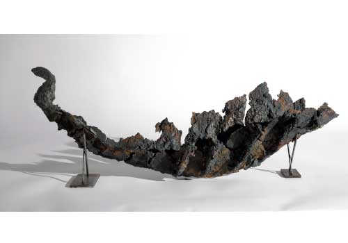 Death Boat 2. Size: 90cm long x 25cm high x 25cm wideMaterials: Ceramic and Cast Iron, 2008
