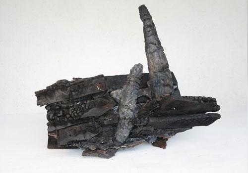 DUG OUT. Cast iron and wood. 46 cm long x 45 cm high x 28c m deep