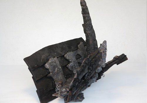 DUG OUT. Cast iron and wood. 46 cm long x 45 cm high x 28c m deep